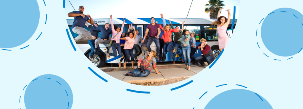 A light blue box features a picture of people jumping for joy in front of a bus. Four blue circles with a dotted outline are spaced out next to the picture.