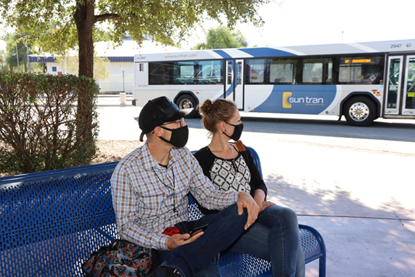 ppl waitingfor bus