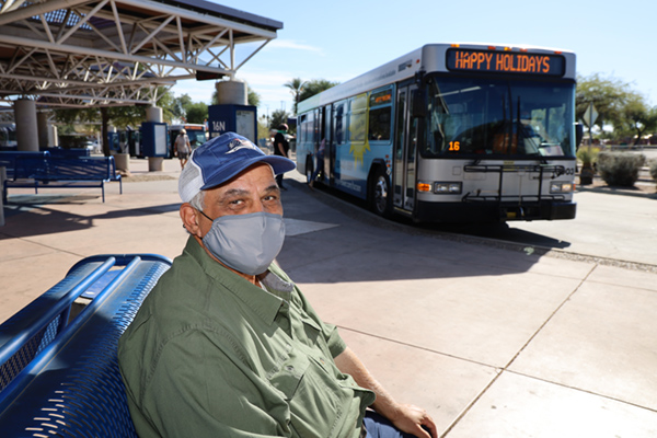 senior waiting for bus