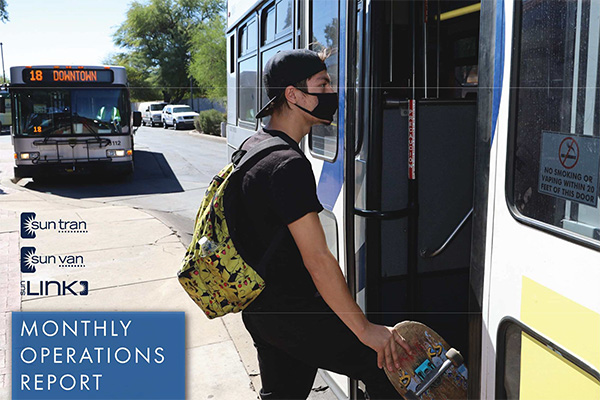 report cover rider in a mask getting on a bus