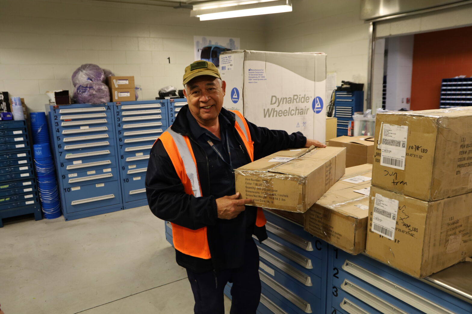 John Baker moves boxes in the parts department.