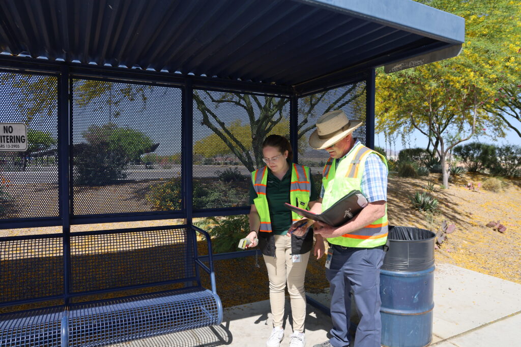 Sun Tran Staff Measuring Temperature at Bus Stop