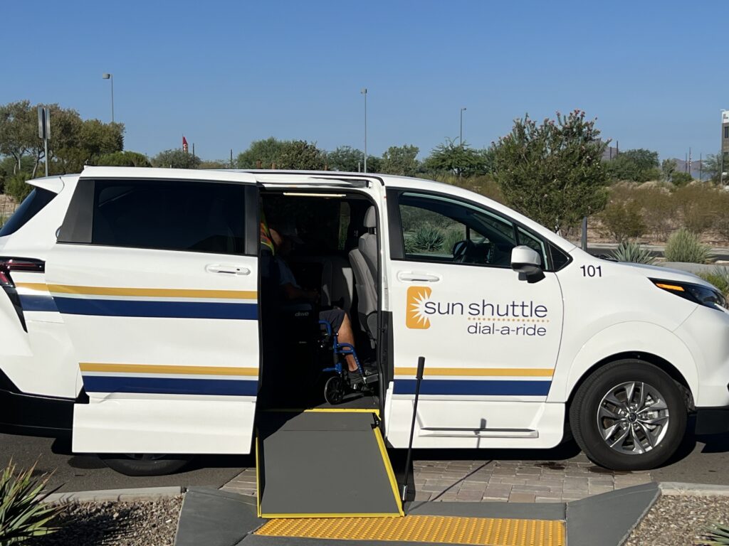 New hybrid sun shuttle vehicle with door open and lift