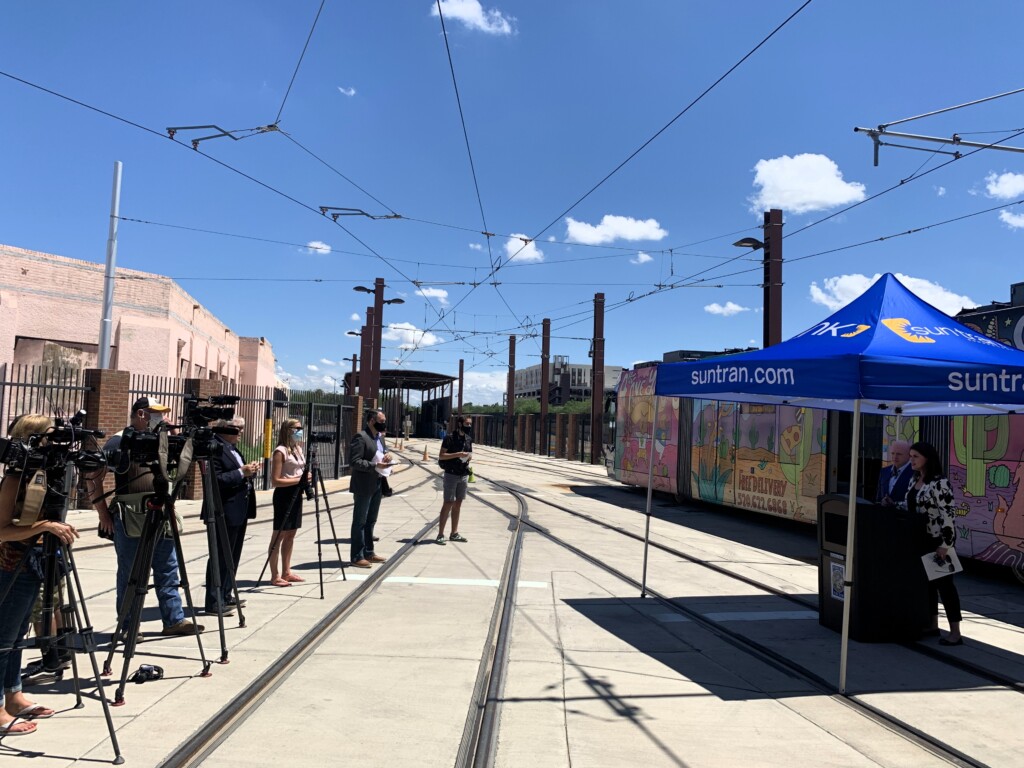 Press conference at sun link with mayor regina romero on the right speaking to the press on the left