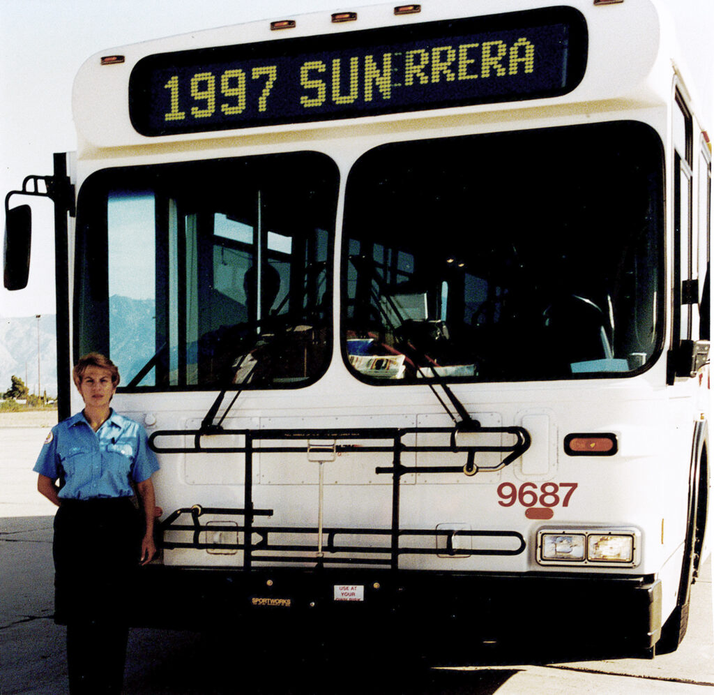 Picture of operator in front of bus in 1997